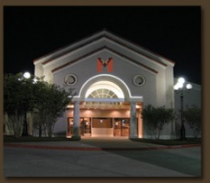 Nighttime picture of the front of the Monarch Event Center